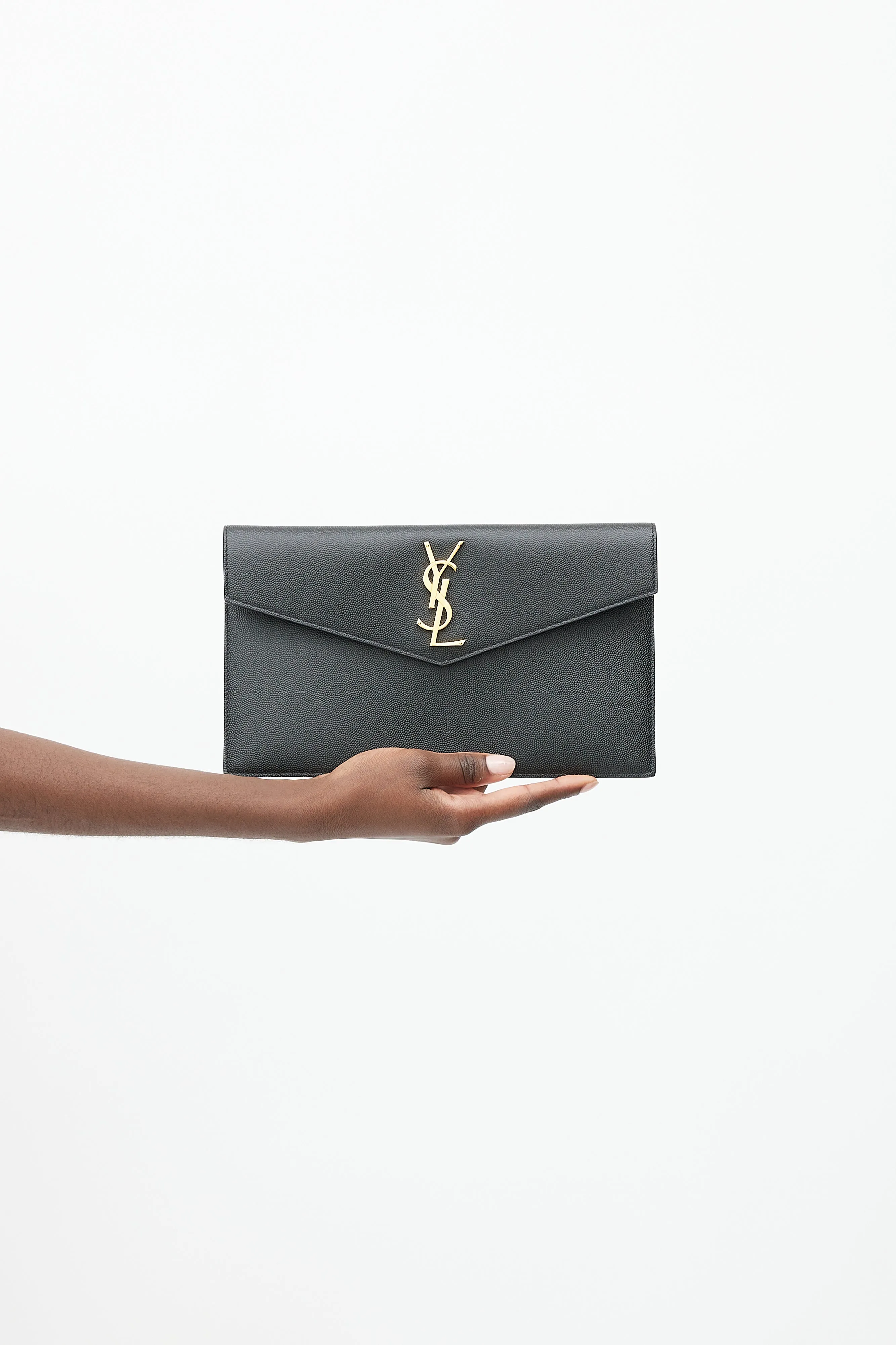 2020 Black & Gold Grained Leather Uptown Clutch